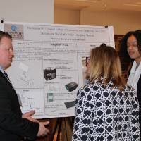 Two women listening to a presentation